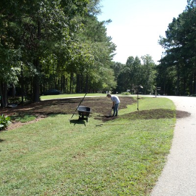Daniel Spreading Organic Compost in Raleigh
